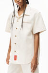 alexander wang short-sleeve work shirt in raw denim vintage white