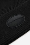 Alexander Wang black dome logo beanie in ribbed wool stretch