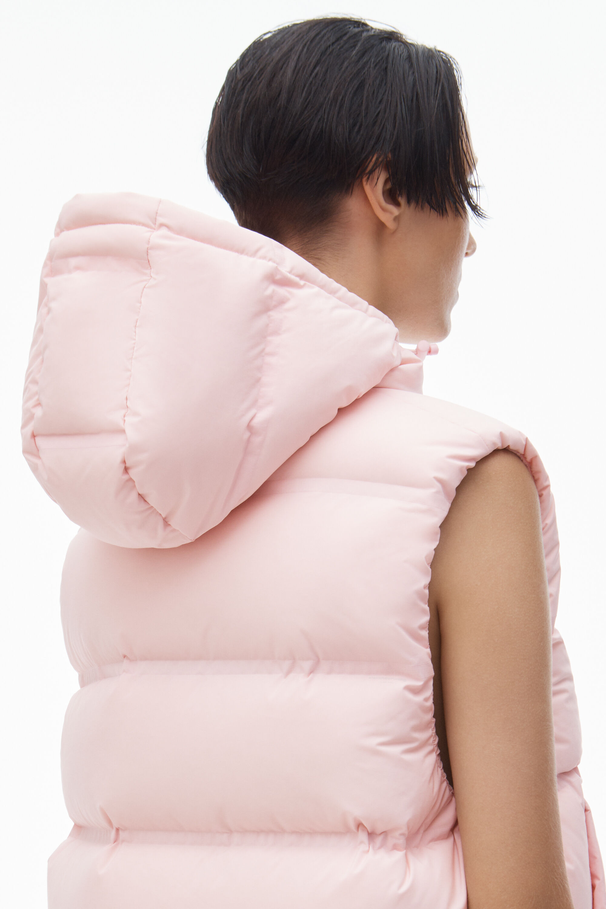 cropped hooded puffer vest with reflective logo in LIGHT PINK