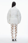 Alexander Wang white puffer coat with dome logo patch