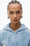 Alexander Wang washed light blue 拷花丝绒紧身拉链连帽衫
